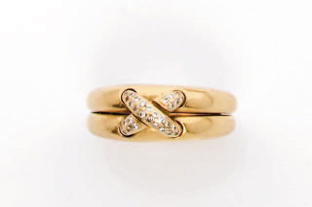 CHAUMET BAGUE DEUX ANNEAUX en or jaune ornée d'un motif lien serti de diamants d&hellip;
