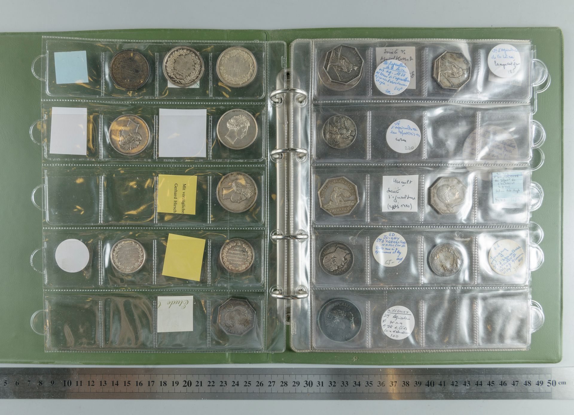Null Agricultural Societies. Binder with 19 silver tokens and medals