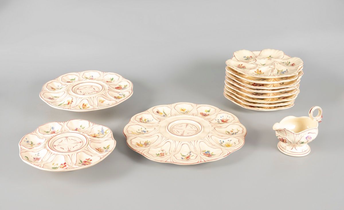 Null 龙昌普

陶器牡蛎套装，含8个盘子和展示架

(筹码)