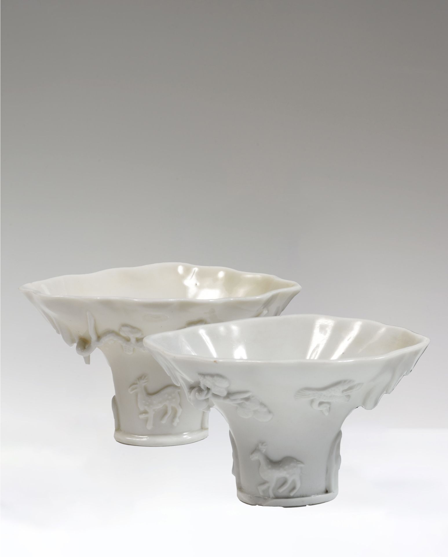 Null 
Chine

Deux coupes libatoires en porcelaine blanc-de-Chine en forme de cor&hellip;