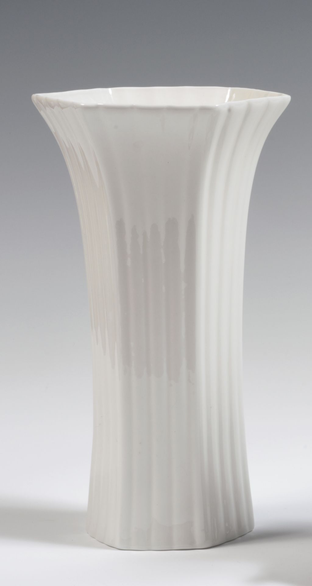 Null 
England

Pair of white porcelain hexagonal vases with raised fluting.

20t&hellip;