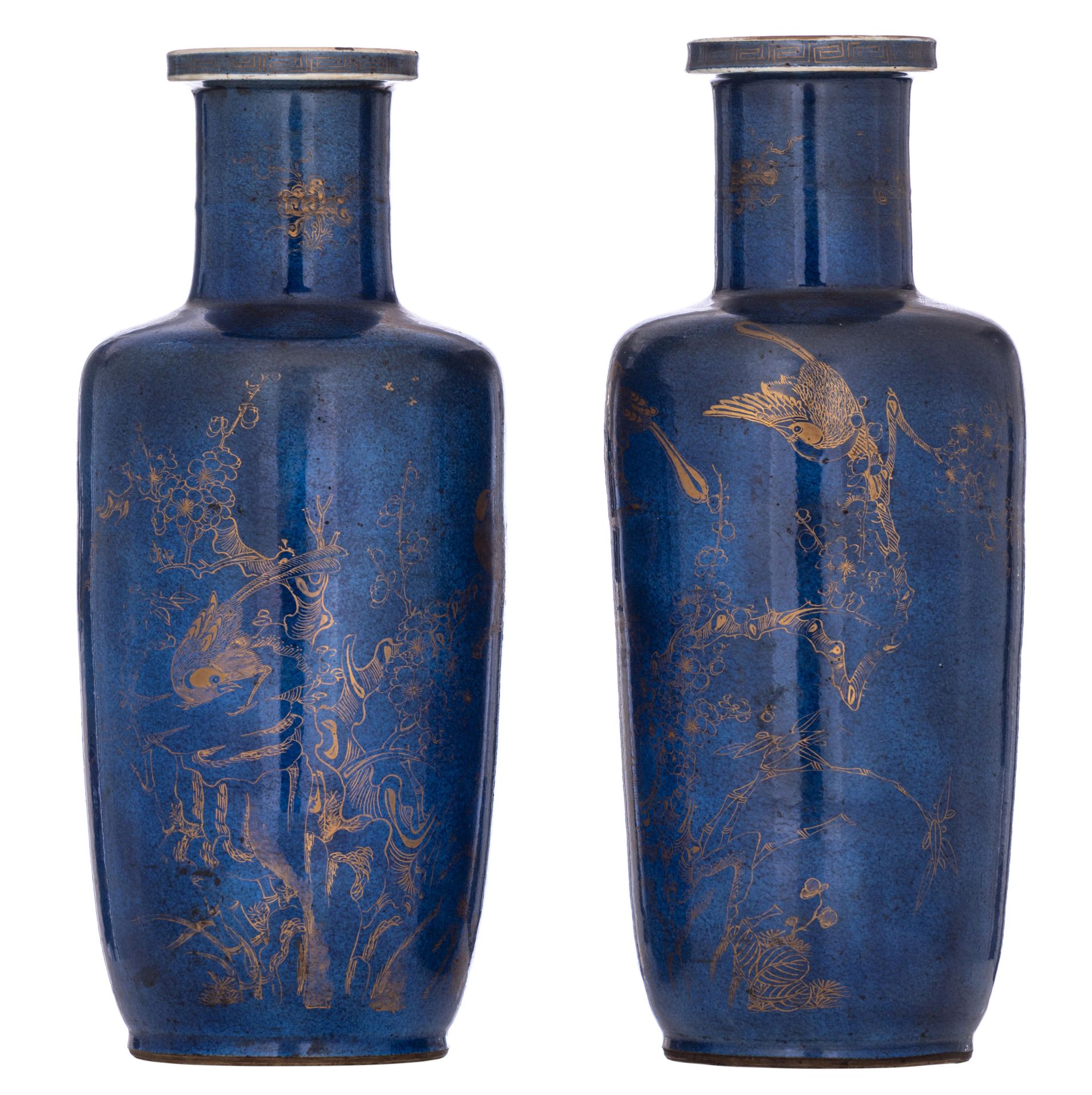 A pair of Chinese powder blue ground and gilt rouleau vases, 18thC, H 45,5 cm 
A&hellip;