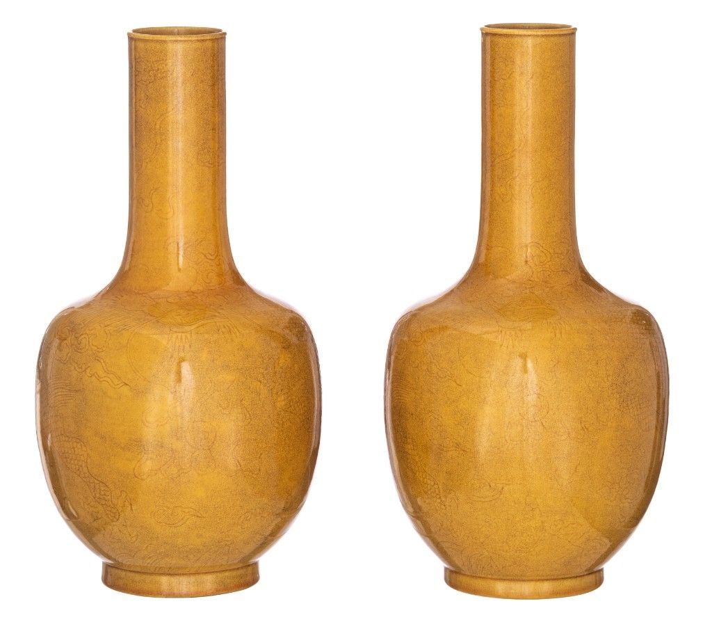 A pair of Chinese incised yellow-glazed 'Dragon' bottle vases, H 33,5 cm A pair &hellip;