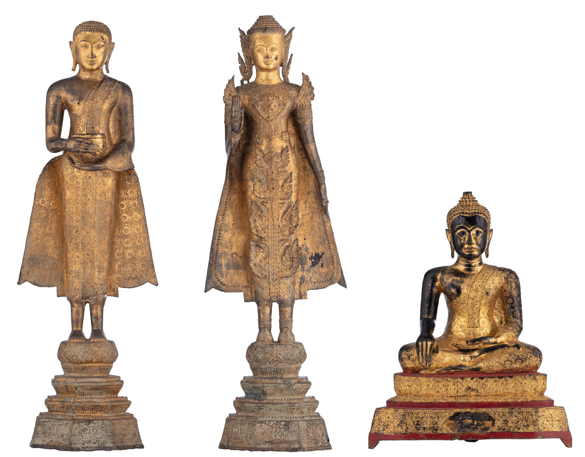 Two gilt bronze standing Buddha and a lacquered and gilt wood seated Buddha, Tha&hellip;