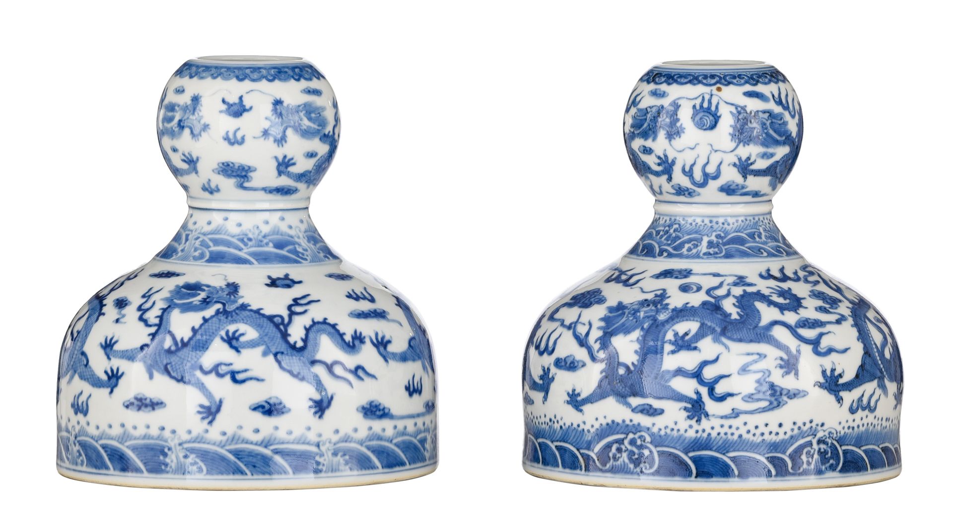 A pair of Chinese blue and white garlic-mouth 'Dragon' bottle vases, with a Daog&hellip;
