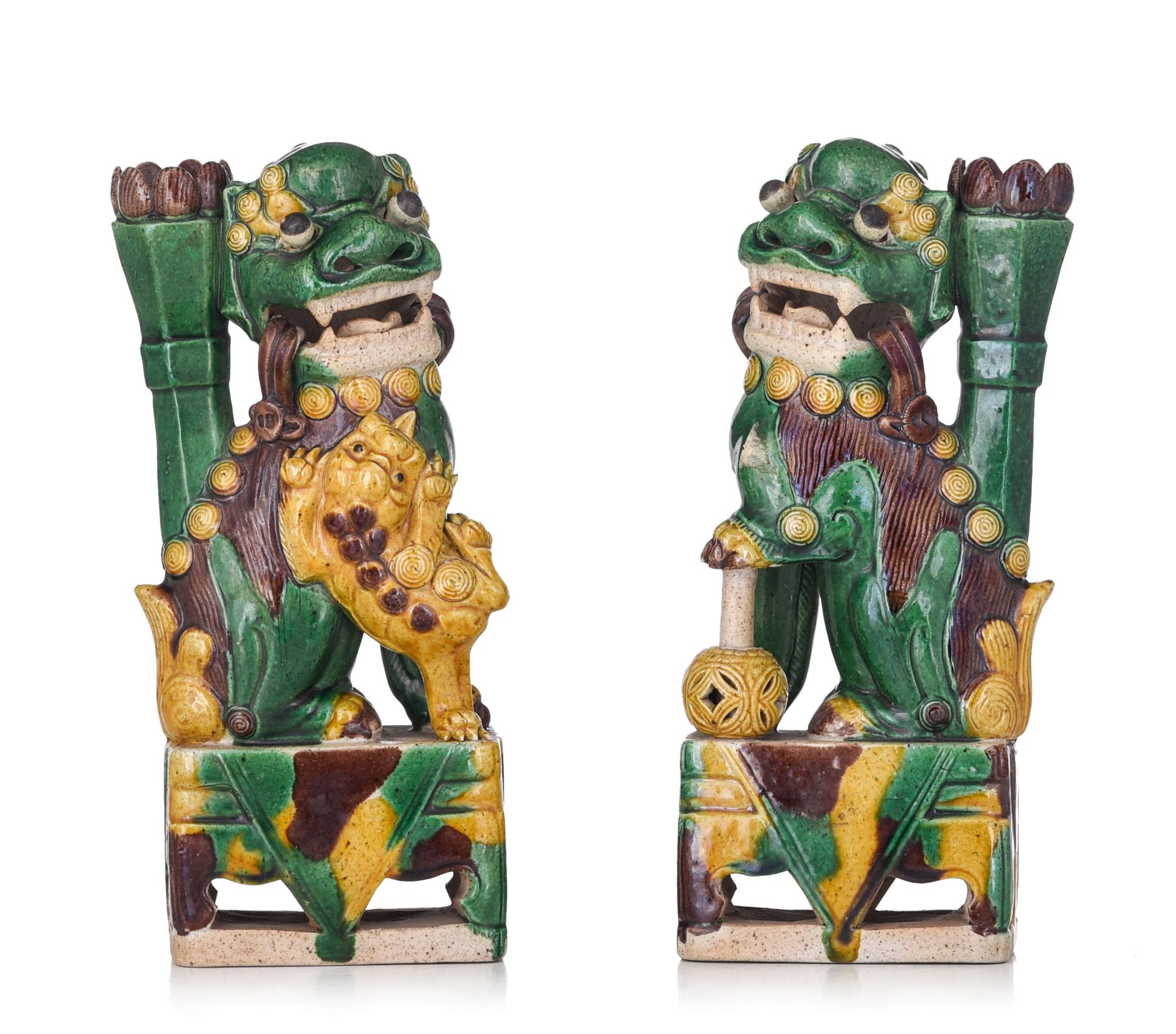 A pair of Chinese sancai-glazed 'Buddhist Lion' joss stick holders, Kangxi perio&hellip;