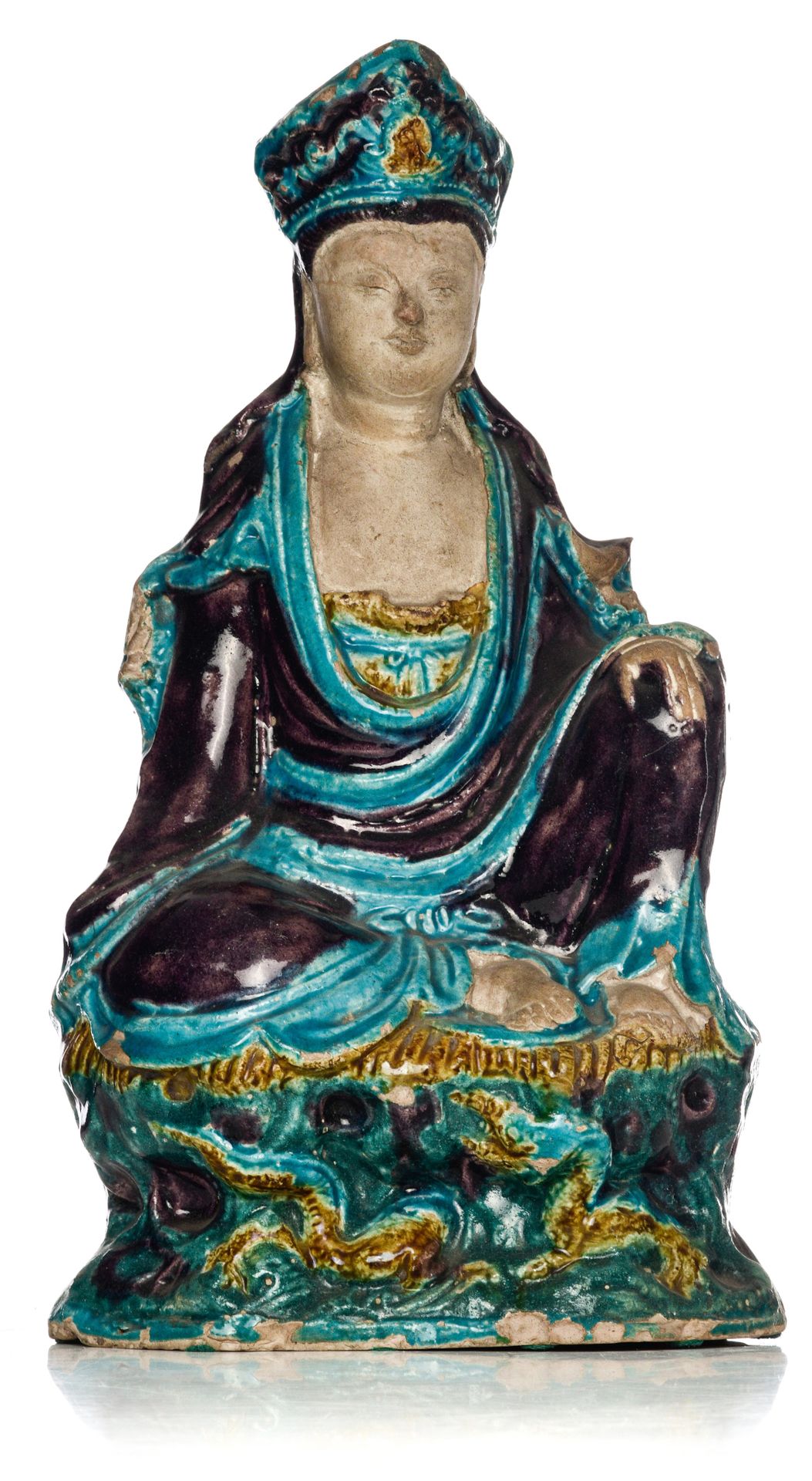A Chinese Fahua-style glazed figure of a seated Guanyin, late Ming period, H 34,&hellip;