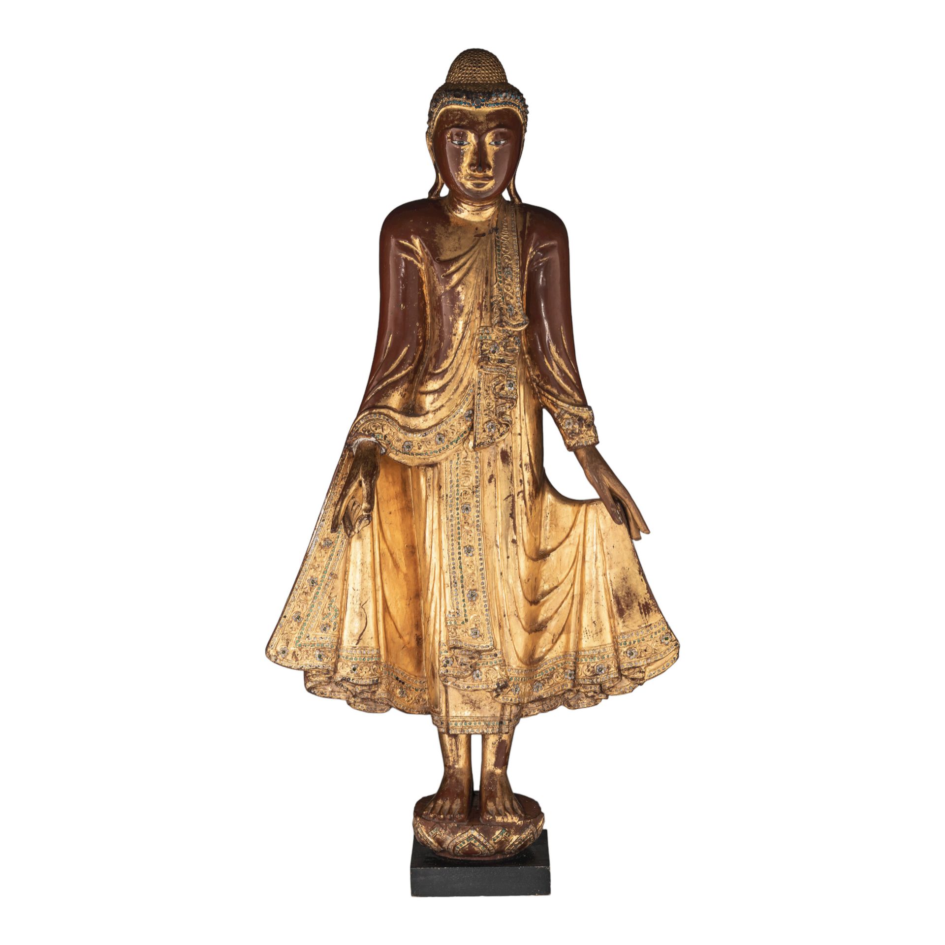 A Burmese gilt lacquered wooden figure of standing Buddha, inlaid with glass bea&hellip;
