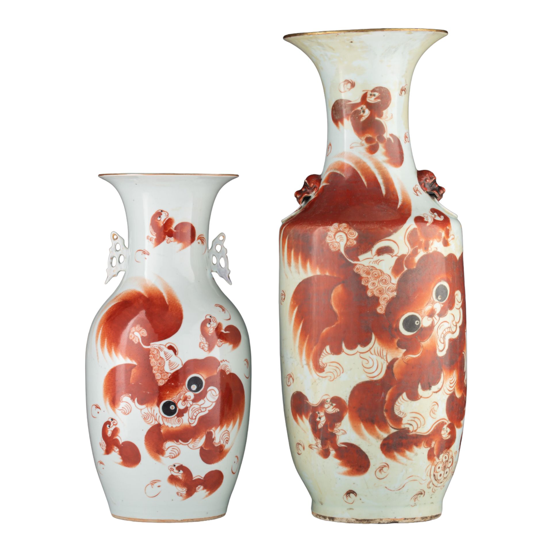 Two Chinese iron-red 'Buddhist lions' vases, both with a signed text and paired &hellip;
