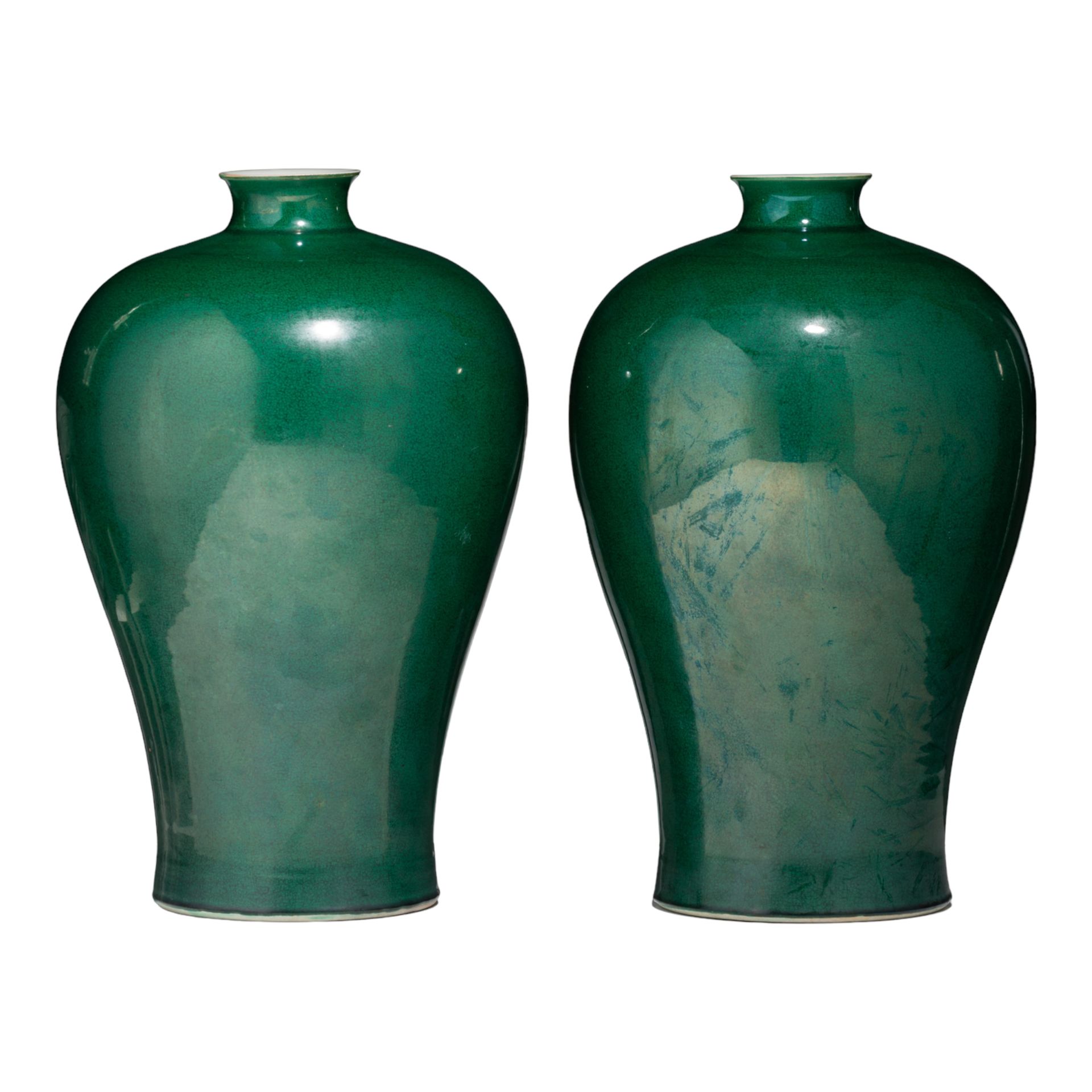 A pair of Chinese monochrome-green glazed meiping vases, with a Yongzheng mark, &hellip;
