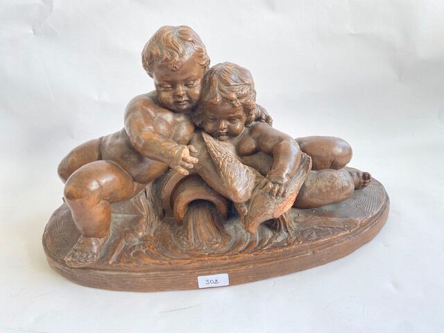 Null Couple of putti caressing a dove in terra cotta

(missing a wing and a fing&hellip;