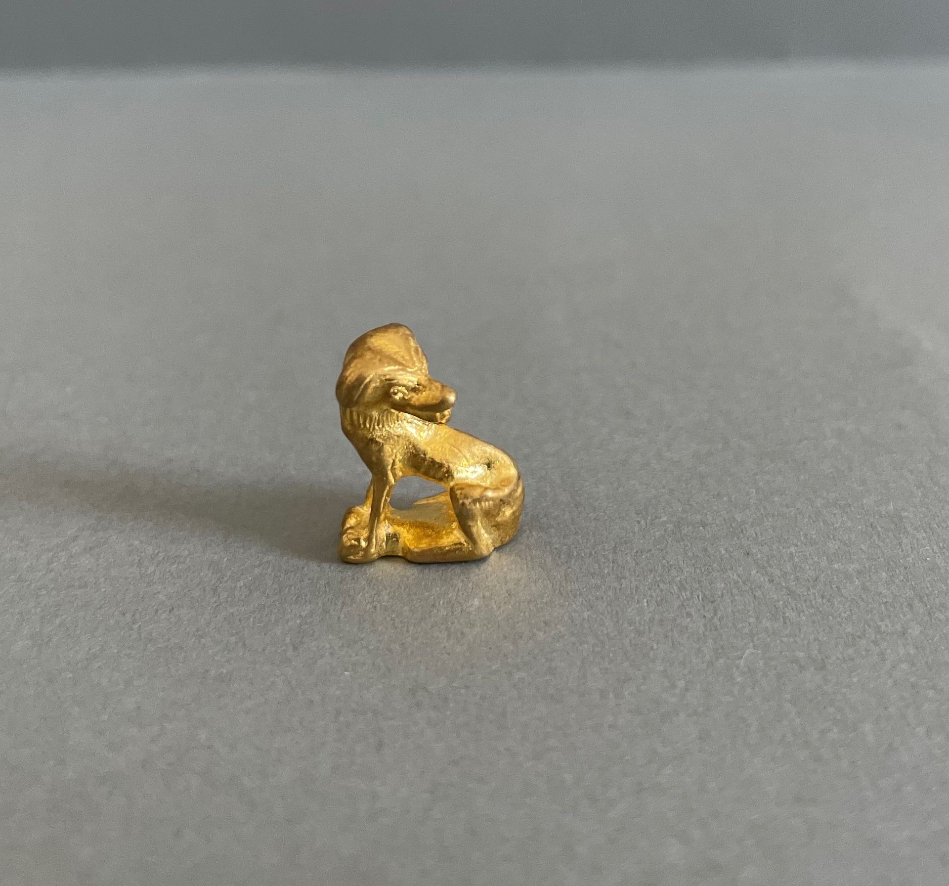 Null Dog-shaped pendant in 14K yellow gold.

Weight : 6,1 g.
