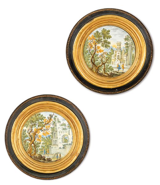 Pair of ceramic tondo from Castelli. Painted with landscape scenes in which figu&hellip;