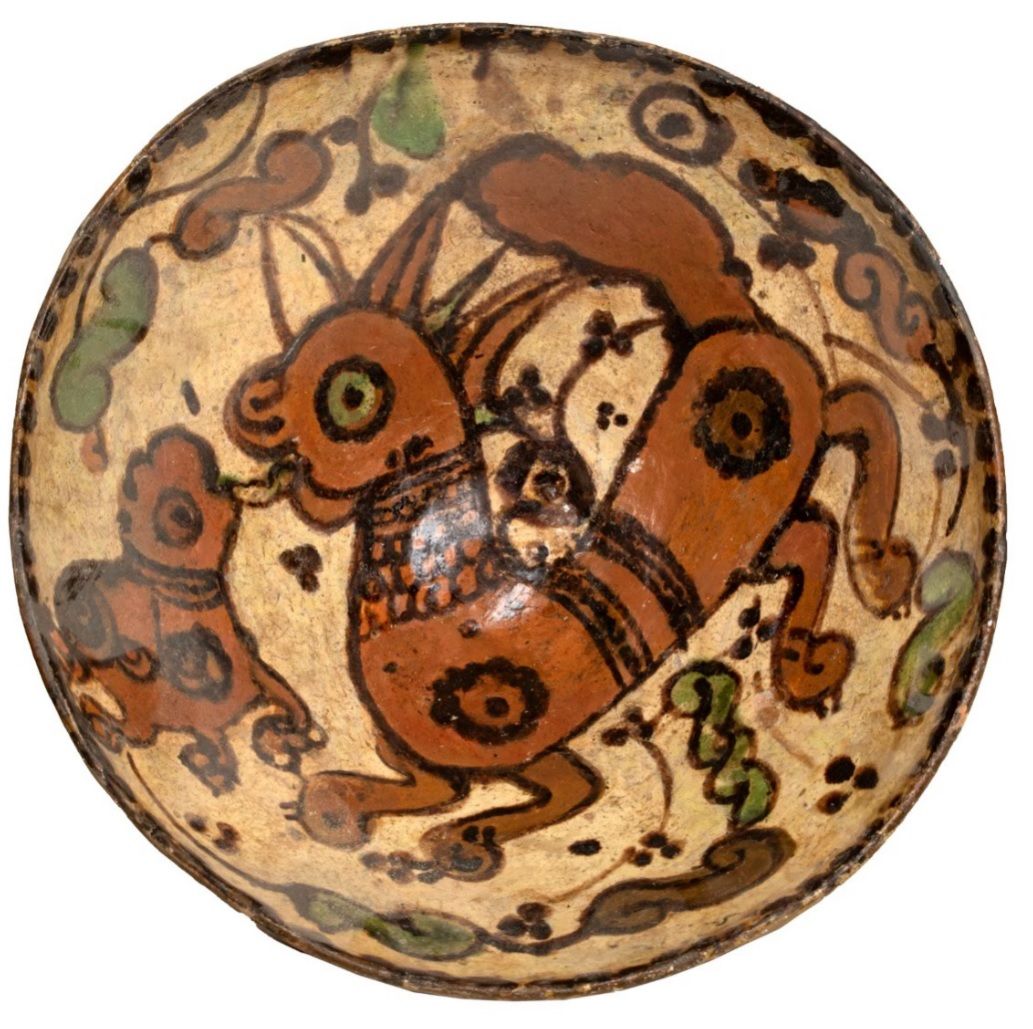 Null 
中世纪多色变幻装饰杯

透明无色釉下的多色装饰陶器

伊朗，11世纪，萨曼王朝时期

被称为 "Sari "的杯子，在奶油色的背景上有红色、黑色和绿&hellip;