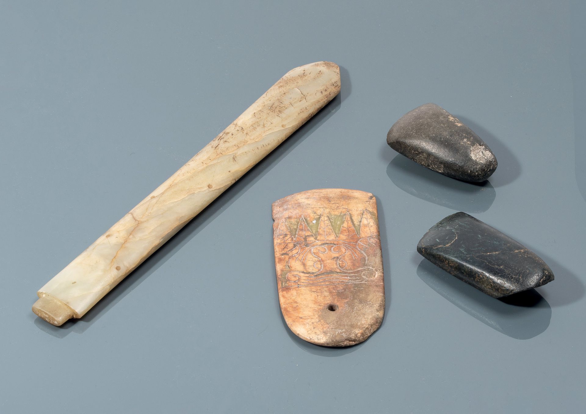CHINE Set of four black, celadon and brown nephrite ceremonial axes, the last on&hellip;