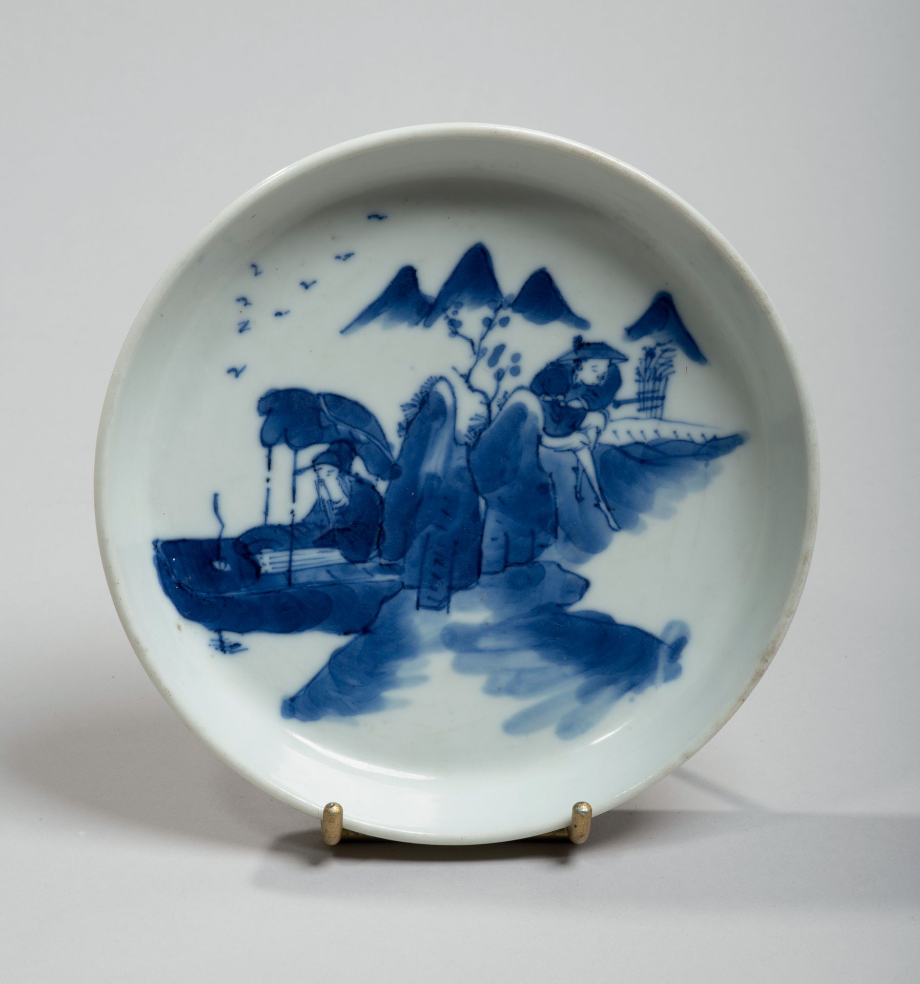VIETNAM, Hue - XIXe siècle 
瓷碗以釉下青花装饰，有一个学者在船上，一个樵夫在石头后面。在背面，有Ngo?n ngoc（玉石游戏）标记&hellip;