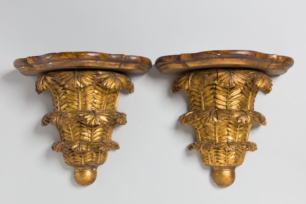 Null Pair of gilded carved wood sconce brackets with foliage motifs.
Height: 37 &hellip;