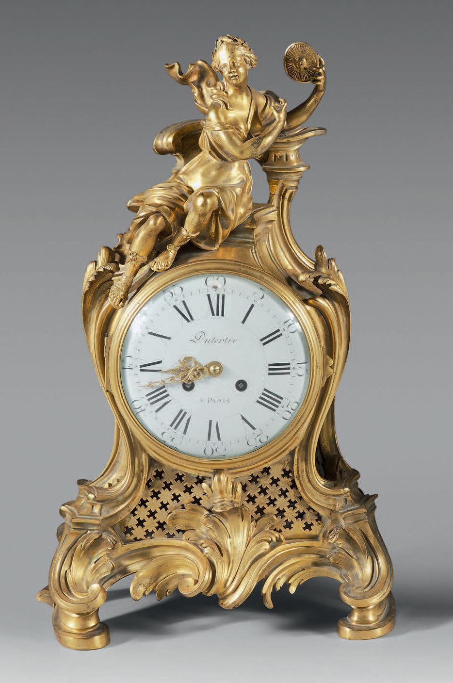 Null Chased and gilt bronze clock, the movement by Dutertre in Paris surmounted &hellip;