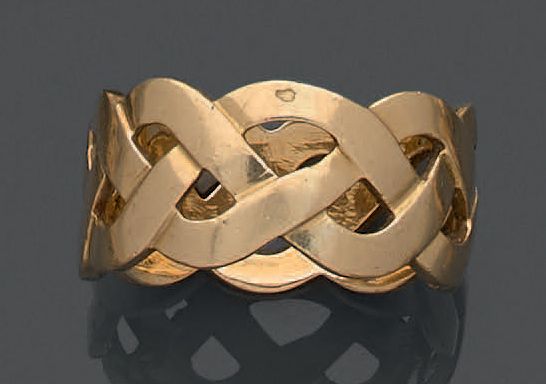 Null 
重量：9.45克，18K(750)黄金制成的戒指，有镂空丝带。