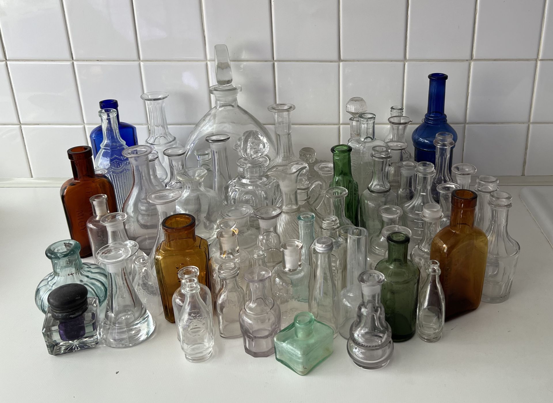 Null Two mannettes: strong set of mismatched crystal or glass bottles, some with&hellip;