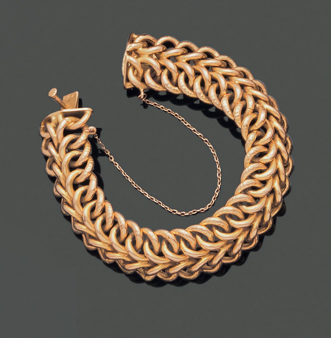 Null Articulated bracelet in 18K (750) yellow gold, formed of double meshes part&hellip;