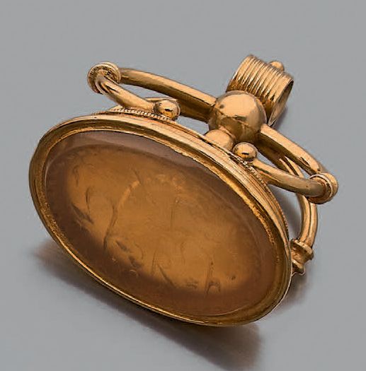 Null Cachet-pendentif en or jaune 18K (750), la base ovale ornée d'un quartz gra&hellip;