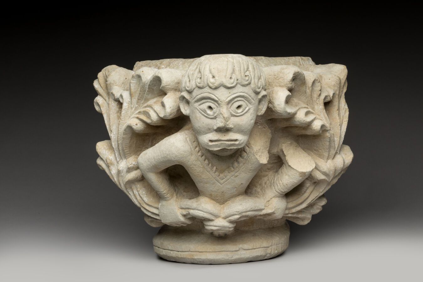 Null France, 12th century. Carved limestone capital, decorated with faces. From &hellip;