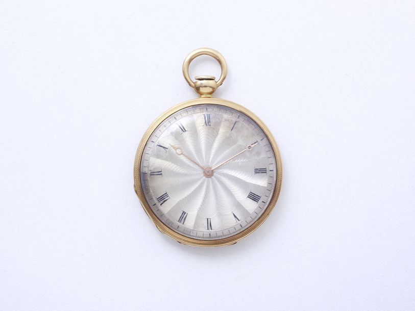 Null Small pocket watch in 750 thousandths gold, silvered guilloché dial with ra&hellip;