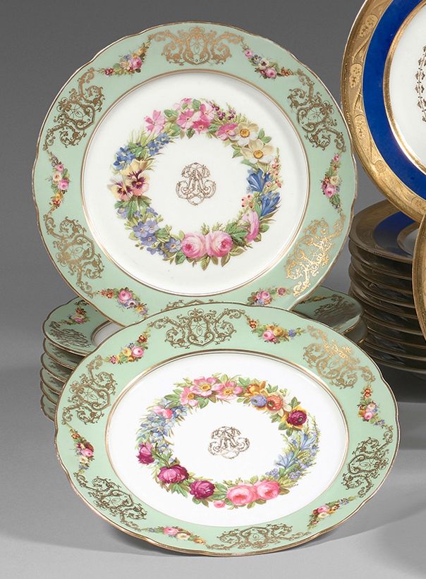 PARIS Eight porcelain plates of contoured form, with polychrome and gold decorat&hellip;