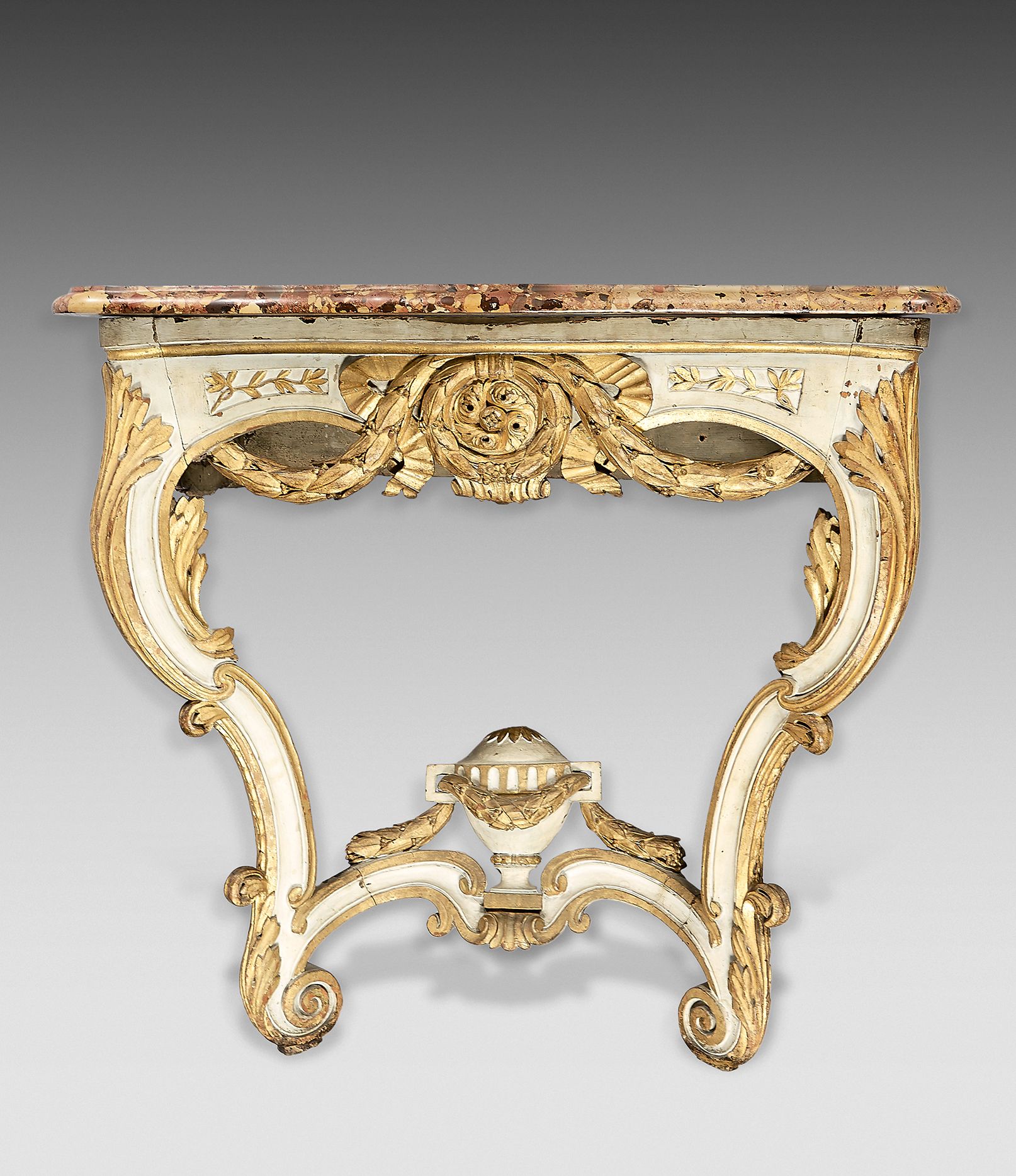 Null A moulded, carved, gilt and cream-coloured console; the belt with garlands &hellip;