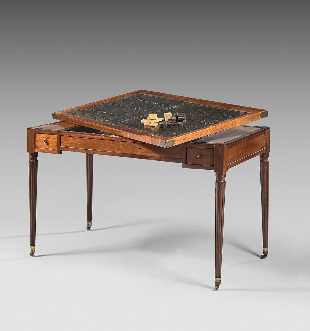 Null Mahogany and mahogany veneer "tric-trac" game table; rectangular in shape, &hellip;