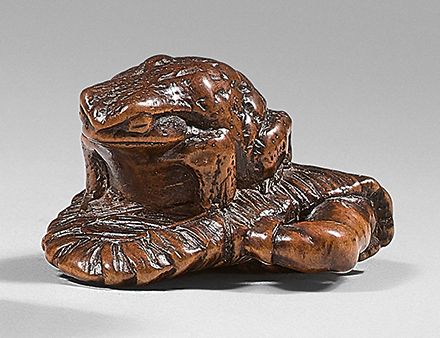 JAPON - Epoque MEIJI (1868-1912) 黄杨木网饰，蟾蜍在折叠的Geta上。签名是Masanao（山田）。
L : 3,2 cm