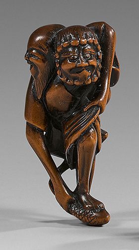 JAPON - XIXE SIÈCLE Boxwood netsuke, Ashinaga carrying Tenaga on his back who ca&hellip;