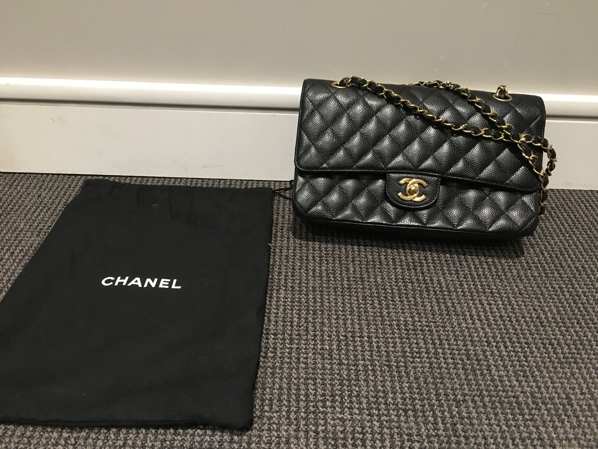CHANEL, circa 2008 
Classic black quilted caviar leather "Timeless" bag, gold me&hellip;