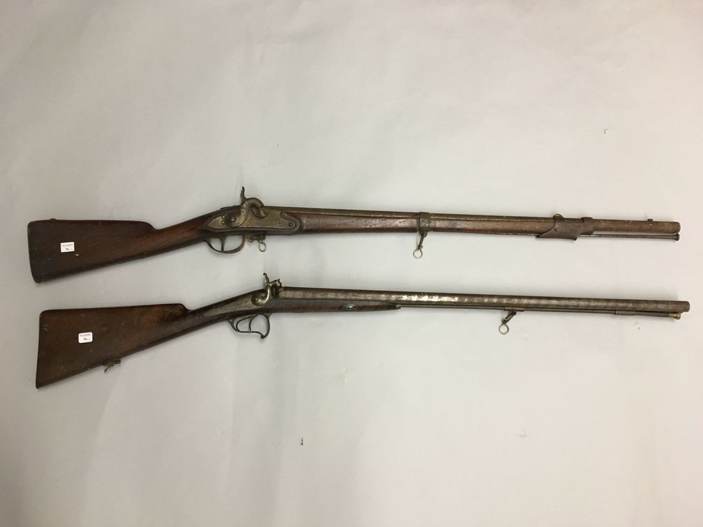 Null 一支桌子形状的双管打击步枪，后锁上有签名："Portalier, fabricant à St Etienne"，刻有铁质配件，胡桃木枪托（轻微氧化）&hellip;