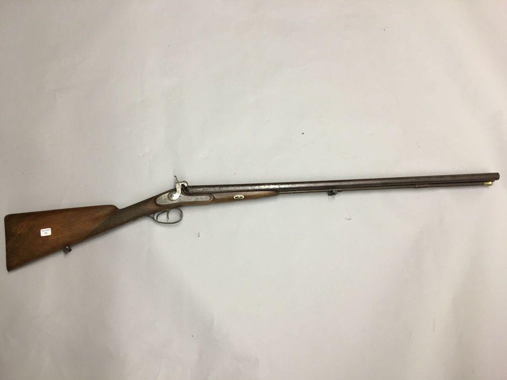 Null 双管台式霰弹枪，雕刻的前板，格子胡桃木枪托

约1850年，状况良好