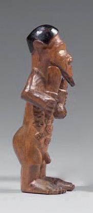 Statuette Bembé (Congo) Le personnage masculin au corps sacrifié brandit un cout&hellip;