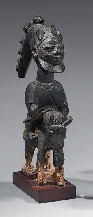 Null 约鲁巴骑手（尼日利亚）
大胡子骑手戴着埃舒神的特色头饰。黑色染色的木头。
 （有些意外，底座已经被木头人吃掉了）。
高：41厘米