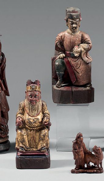 CHINE - XIXe siècle Due statuette di dignitari taoisti in oro e legno laccato po&hellip;