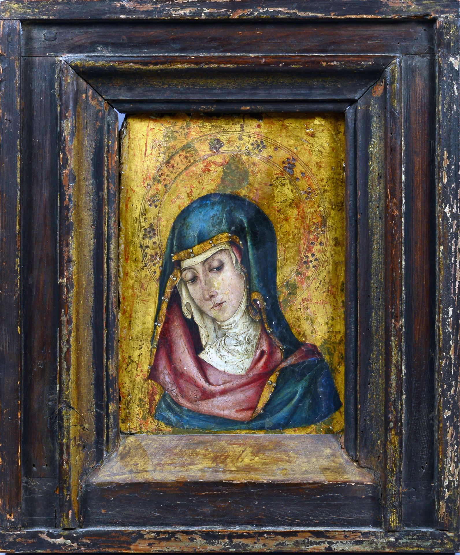 École ESPAGNOLE du XIXe siècle 金色背景上的圣母头像
面板，一块木板，没有镶边。
26.5 x 15厘米
缺失和修复。