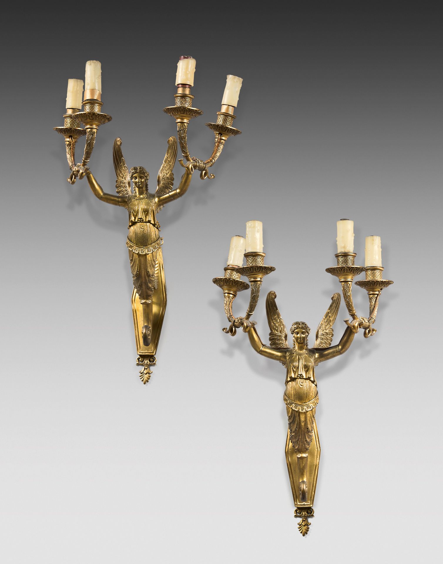 Null Pair of large four-light sconces in chased and gilded bronze in the form of&hellip;