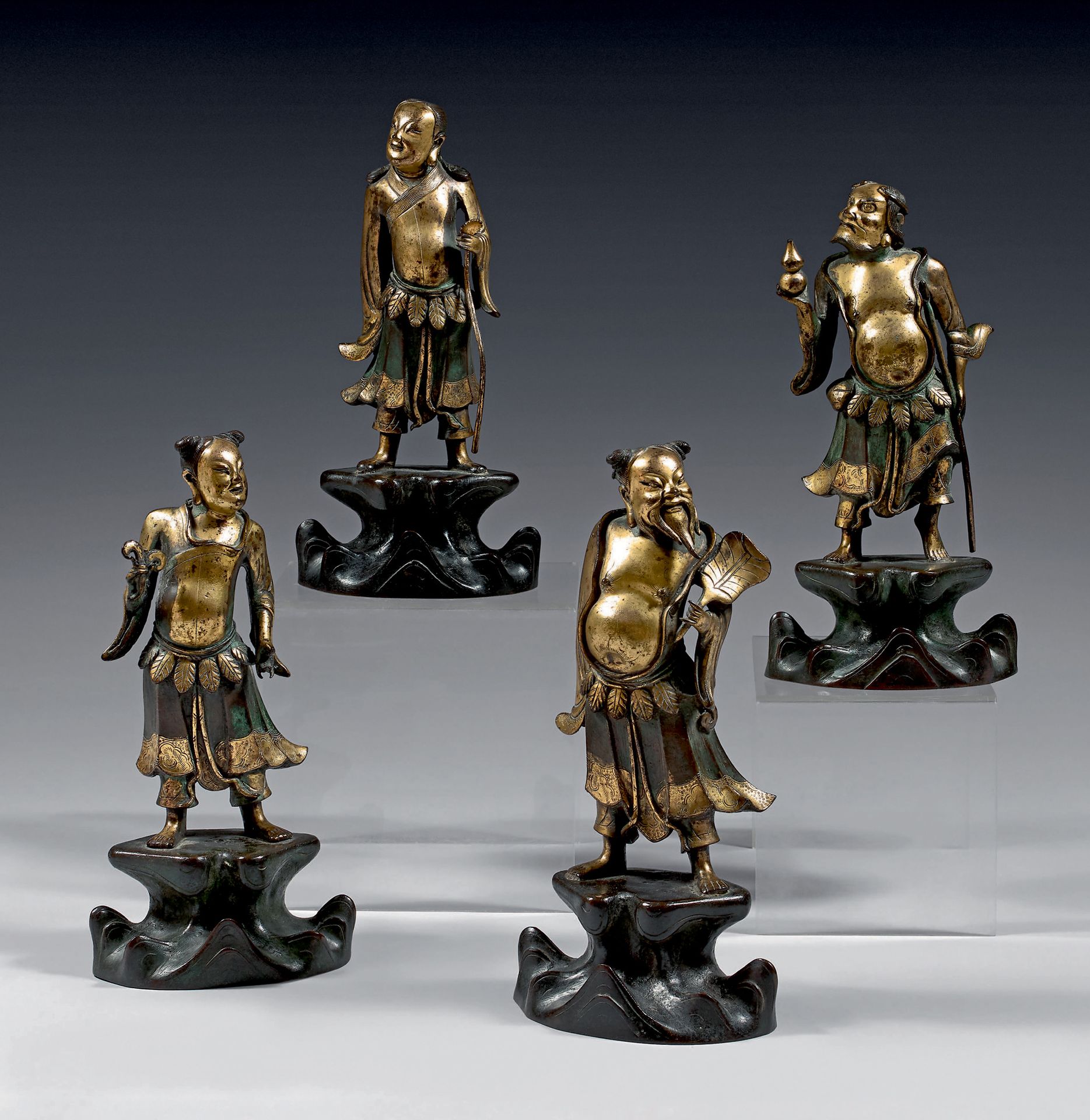 CHINE - Fin de l'époque Ming (1368-1644) Ensemble de quatre statuettes en bronze&hellip;