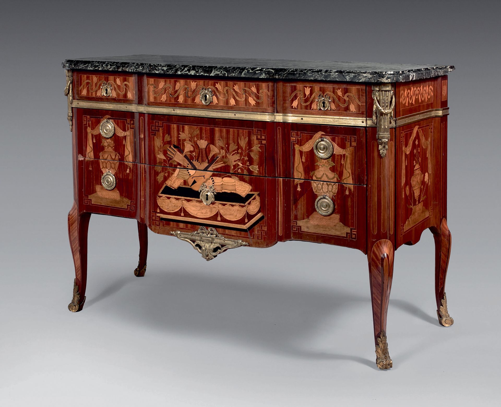 Null Chest of drawers inlaid with music trophies on an entablature with drapery,&hellip;
