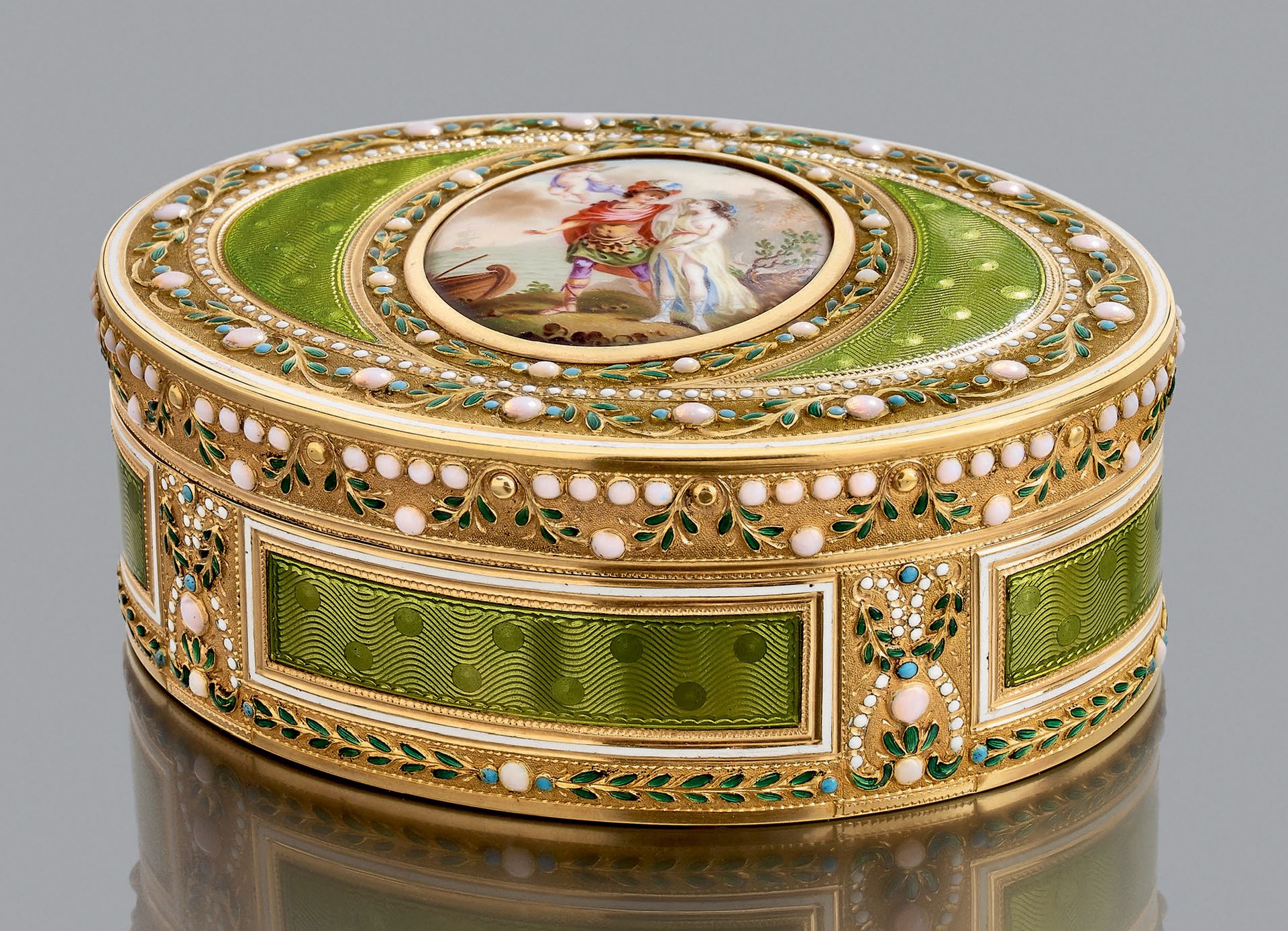 Null Tabaquera de oro de 750 milésimas de forma ovalada, con decoración esmaltad&hellip;