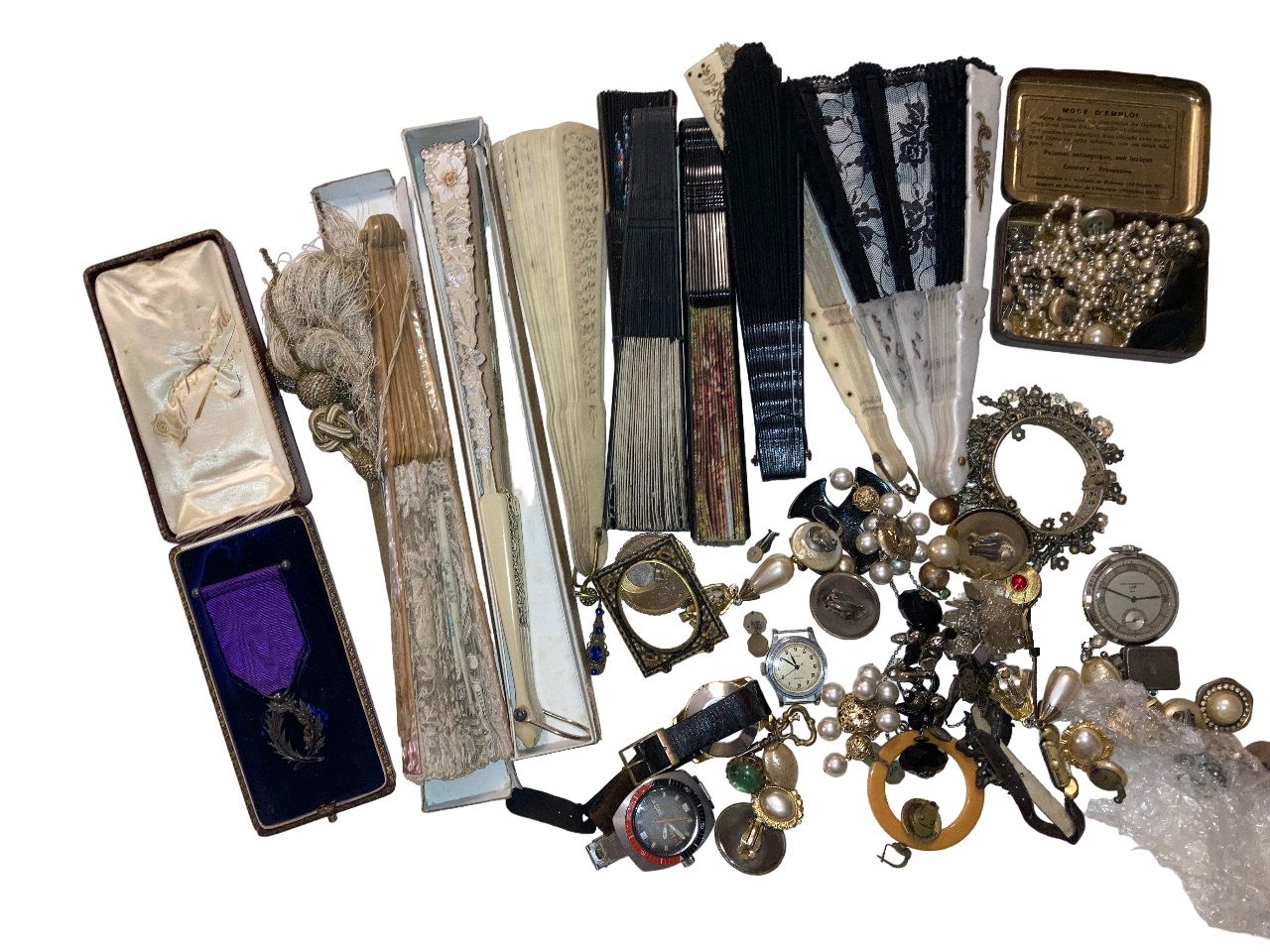 Null Lot of fancy jewelry, fans, watches including a pocket LIP.