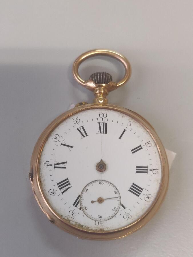 Null 87. Gold pocket watch (missing glass).

Gross weight : 51,9 g.