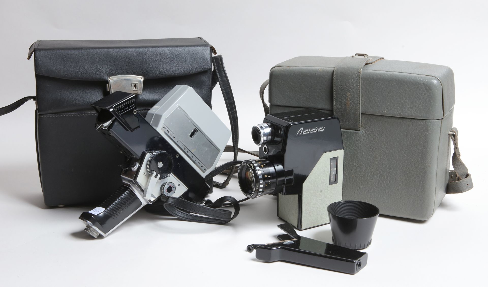 Null 电影院，电影设备。一套两台杂牌相机：Omo Nada相机（包，配件）和Bolex 155超级相机（包）。
