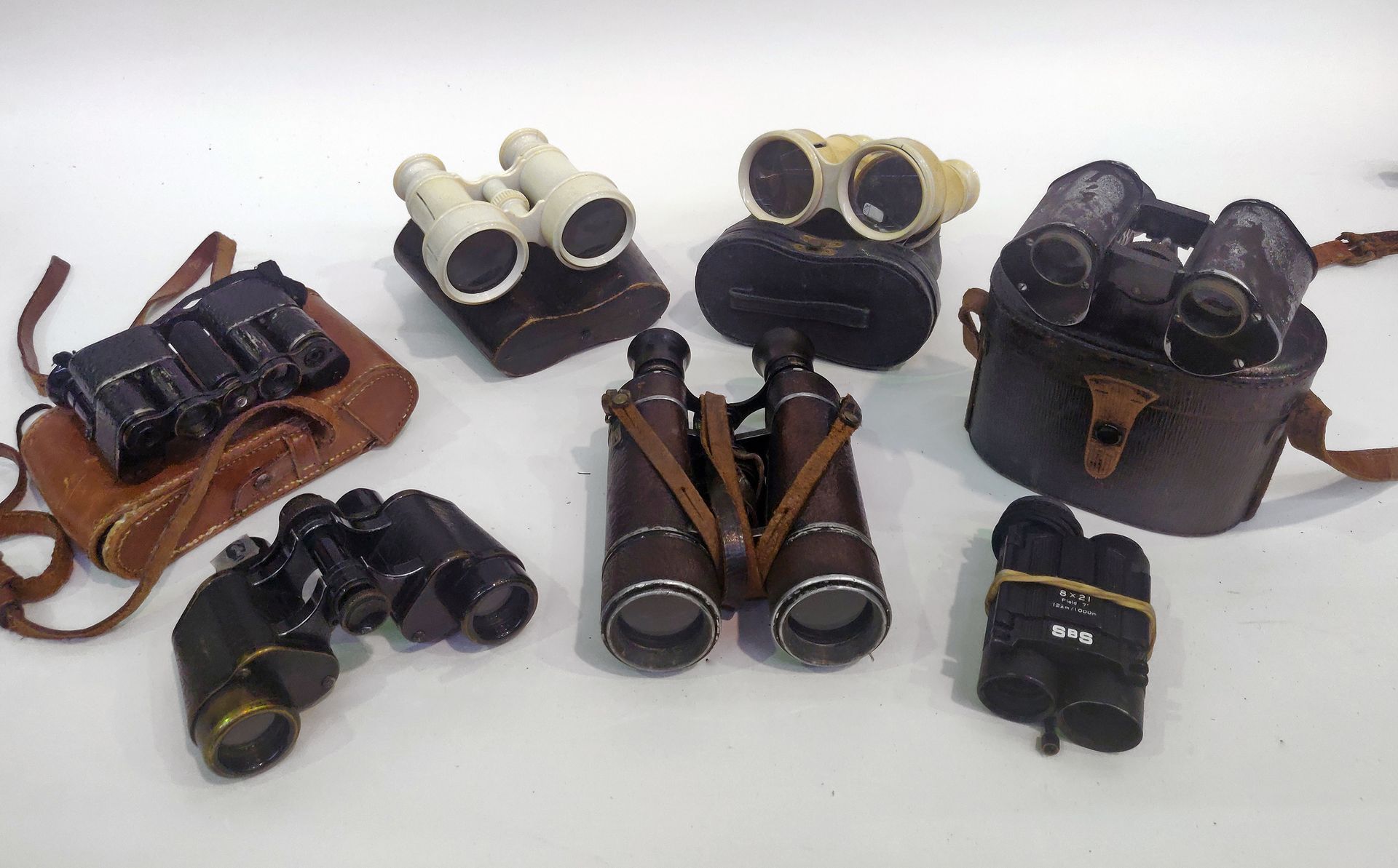 Null Set of six pairs of various binoculars.