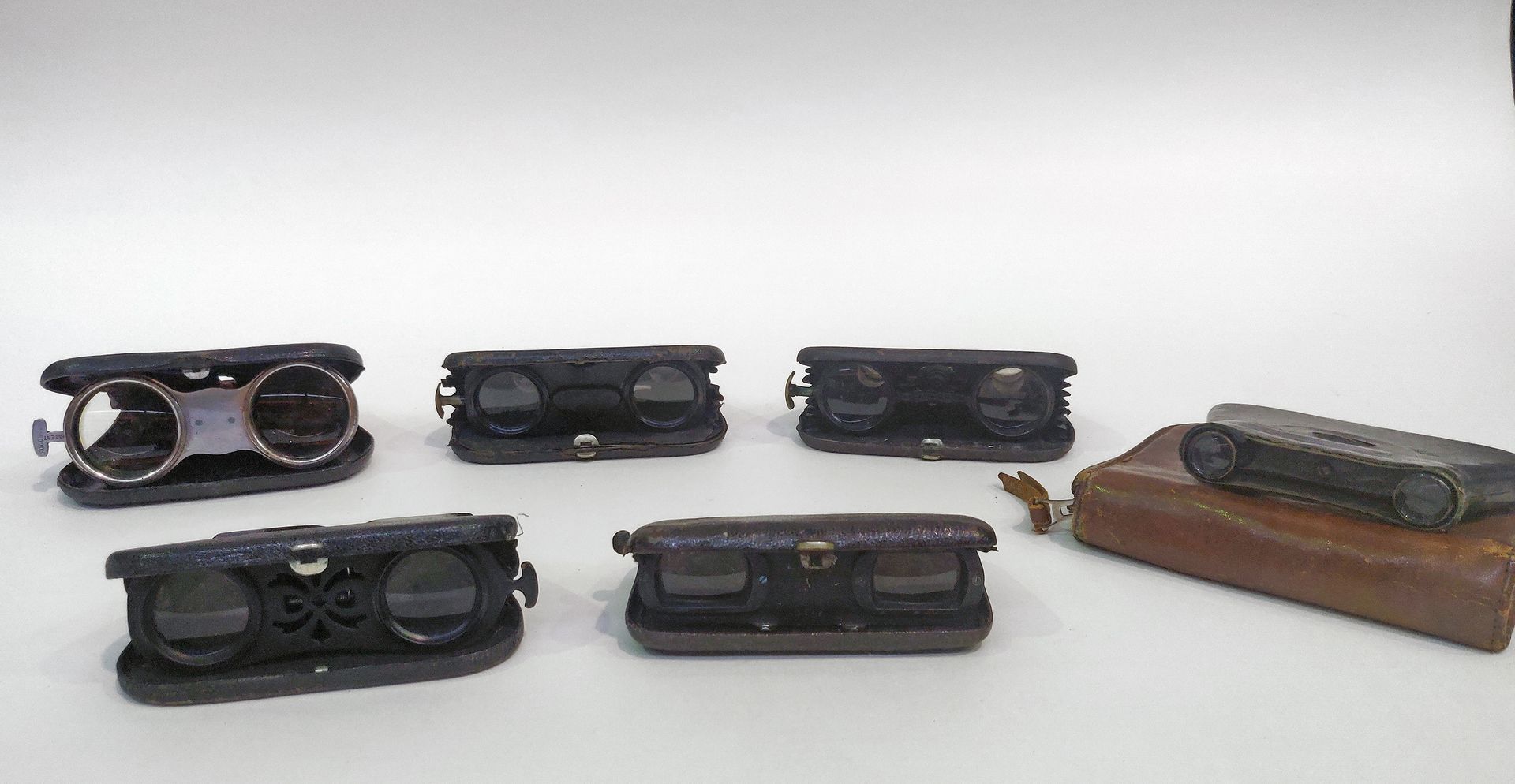 Null Set of six pairs of various binoculars.