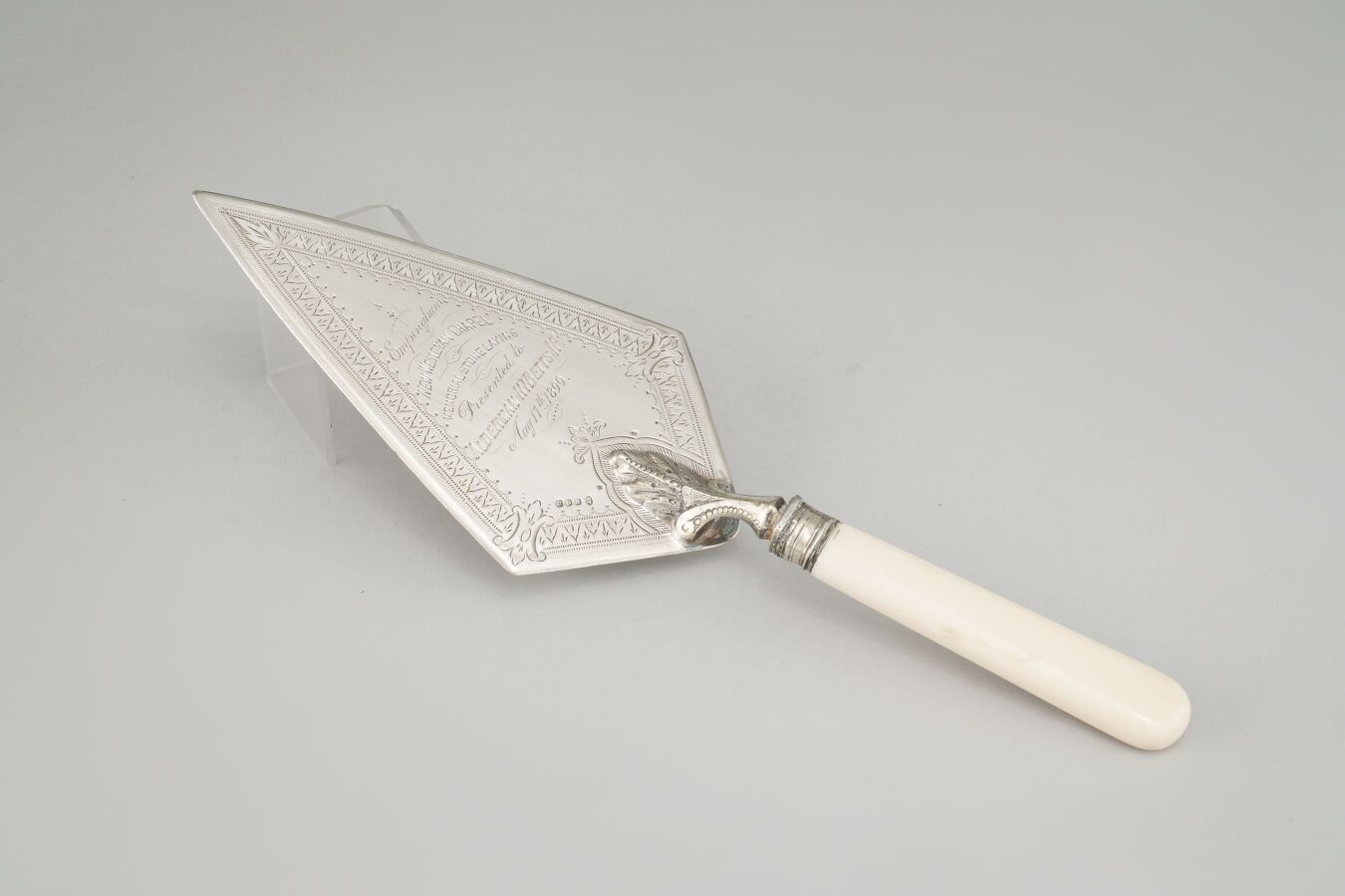 Null Silver-plated metal and bakelite imitation ivory ceremonial shovel, dated A&hellip;